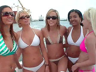 Group of college lesbians licking and fingering each other on a boat